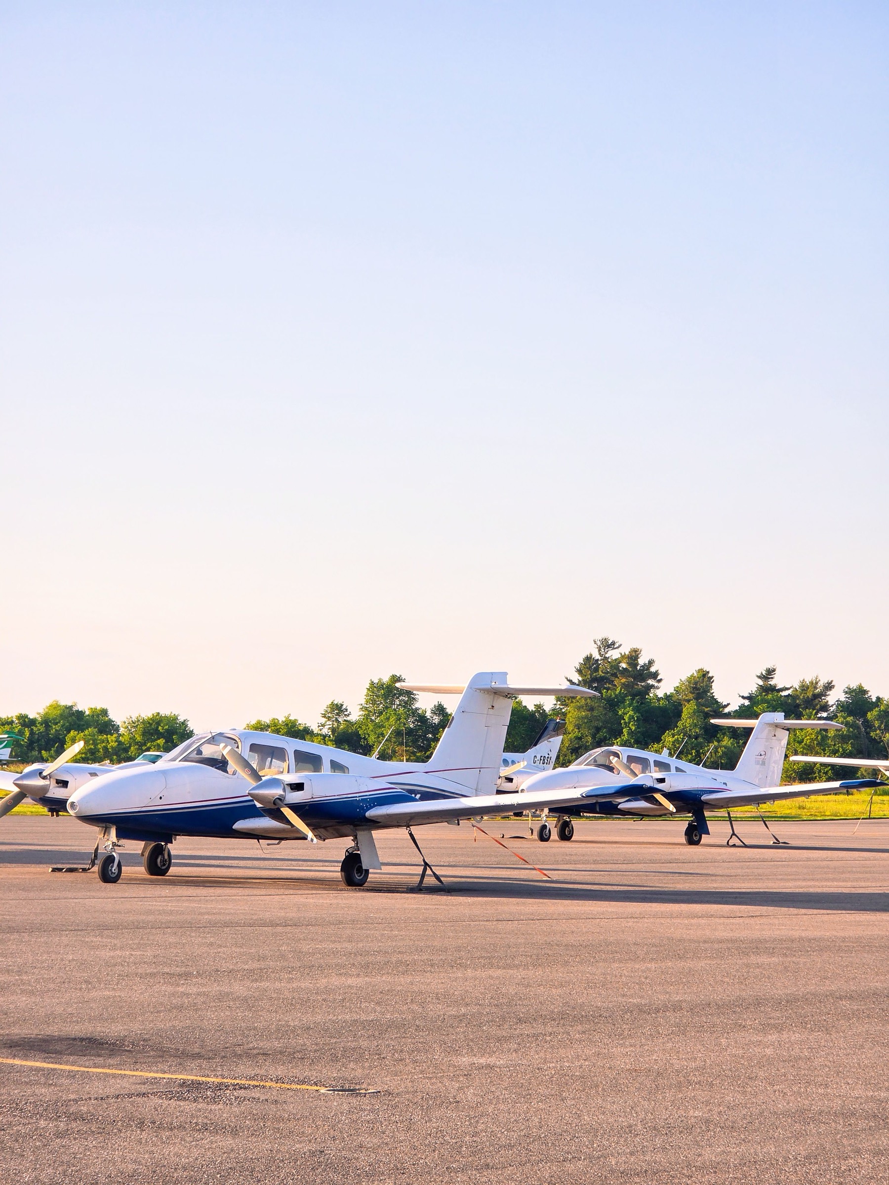 Line of training aircraft at a flying school