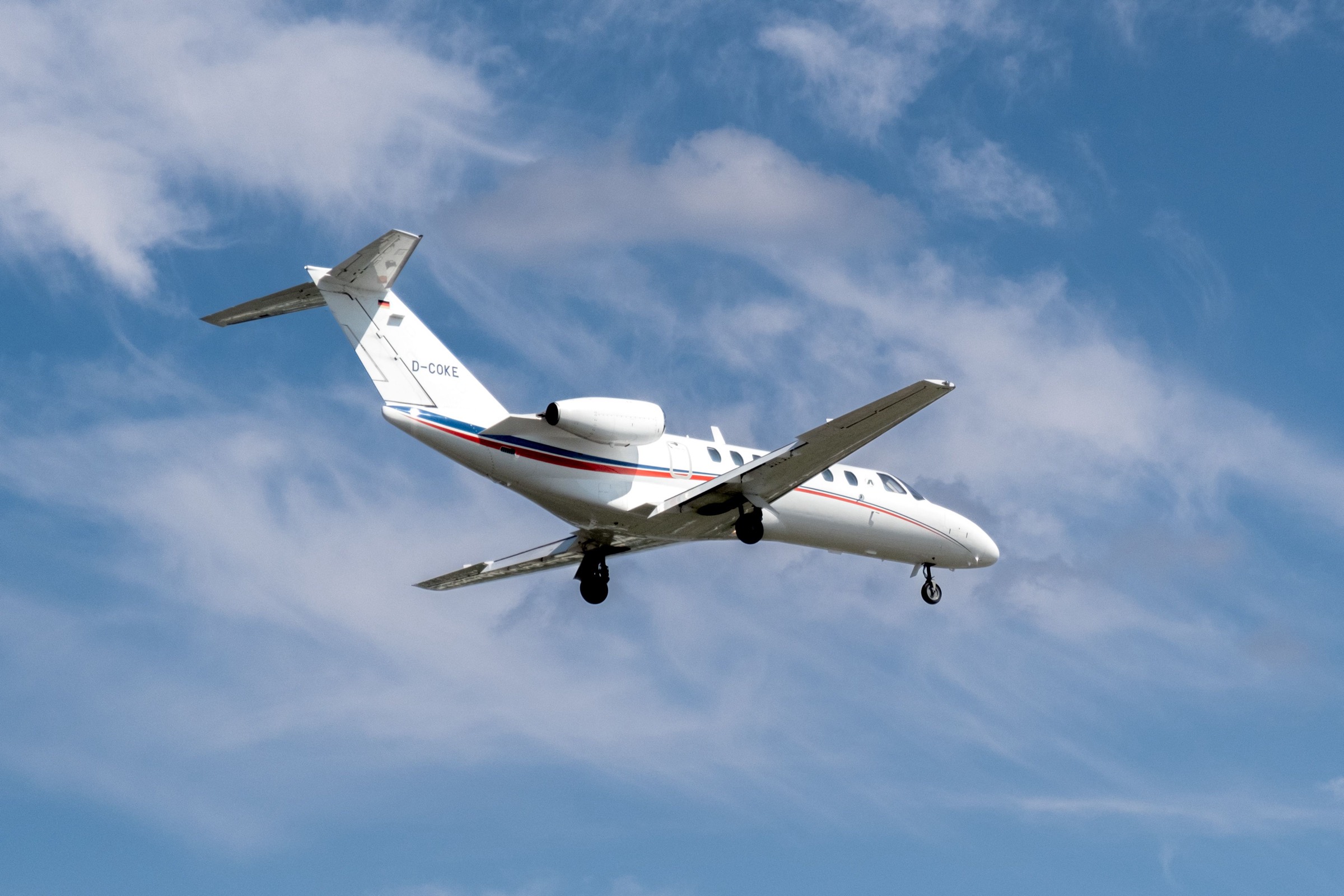 Light business jet in flight